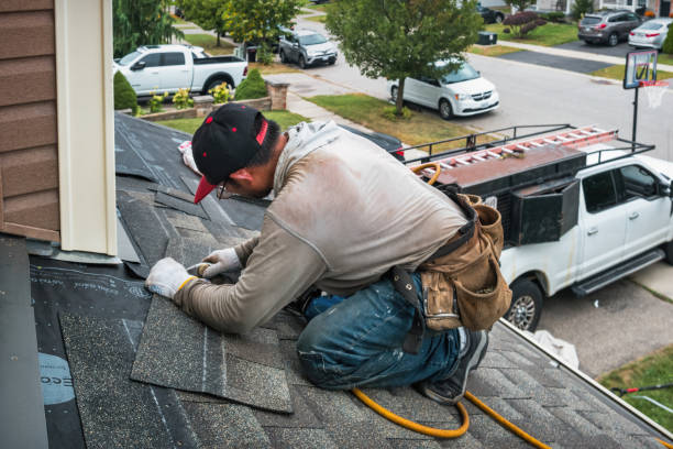 Professional Flat Roof Repair technician working in Falls City, OR